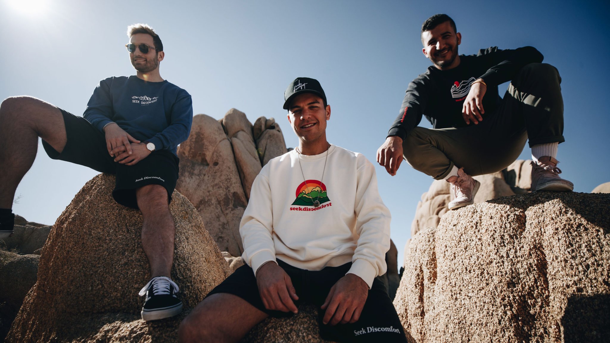 The Yes Theory digital media company recruited ecommerce and fashion veteran Bryan Spunt (center) to run Seek Discomfort shortly after they launched it in 2018. Yes Theory co-founders Matt Dajer and Ammar Kandil are at left and right, respectively. Photo courtesy Seek Discomfort